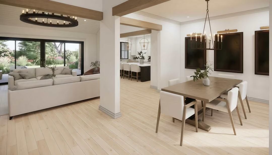 Light Wood Floors and Layered Lighting Anchor an Open-Plan Living Space