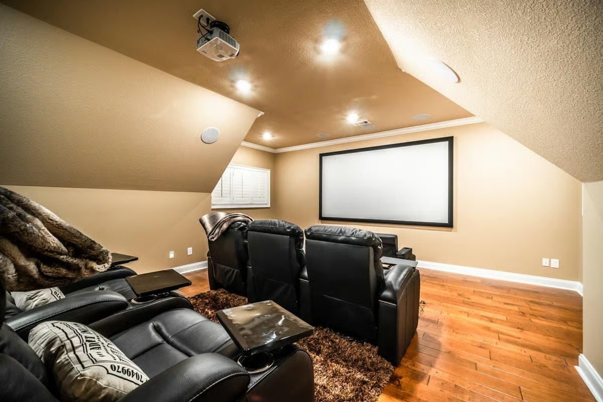 Leather Recliners, a Ceiling Projector, and Hardwood Floors That Don't Belong in a Theater