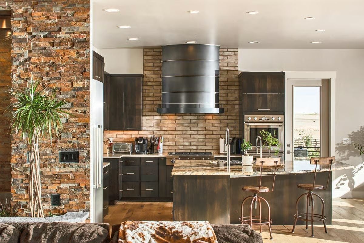 Cylindrical Steel Hood and Bare Brick Make a Case for Industrial Restraint