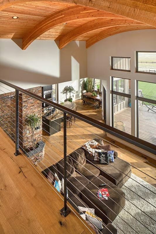 Balcony Overlook and Cable Rail Turn the Great Room Into a Two-Story Event