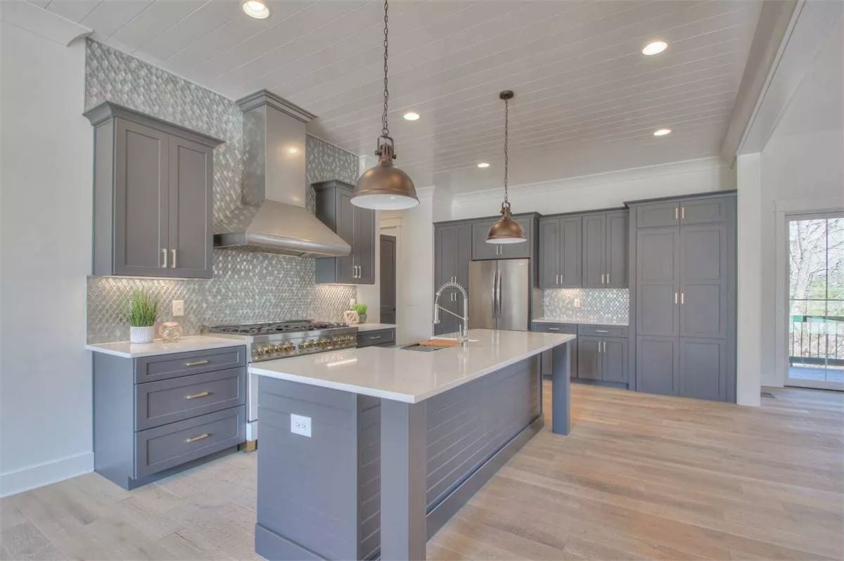 Gray Shaker Cabinets and Copper Pendants That Actually Work Together