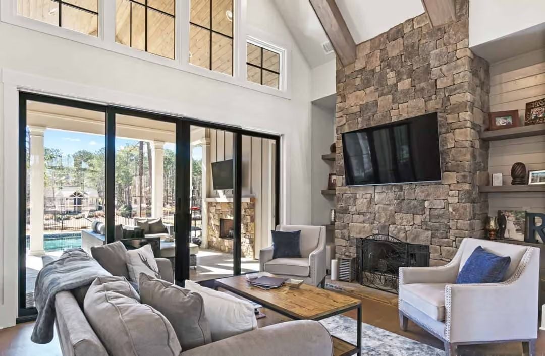 Floor-to-Ceiling Stone and a TV That Actually Belongs There