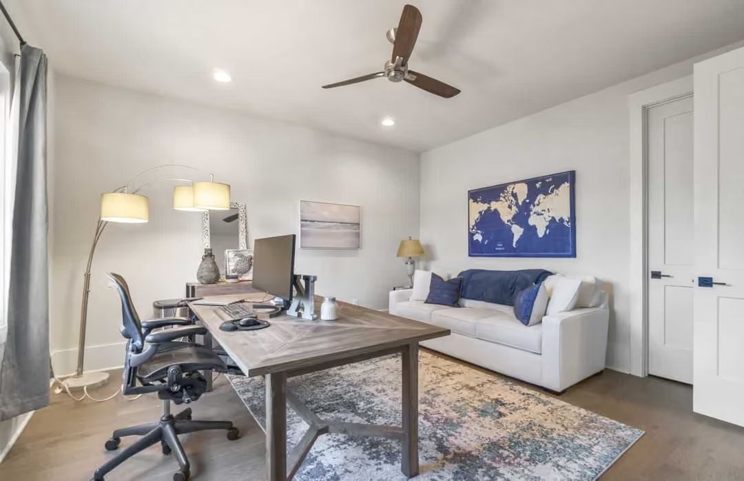 World Map on the Wall, Herman Miller at the Desk — Office Setup Done Right