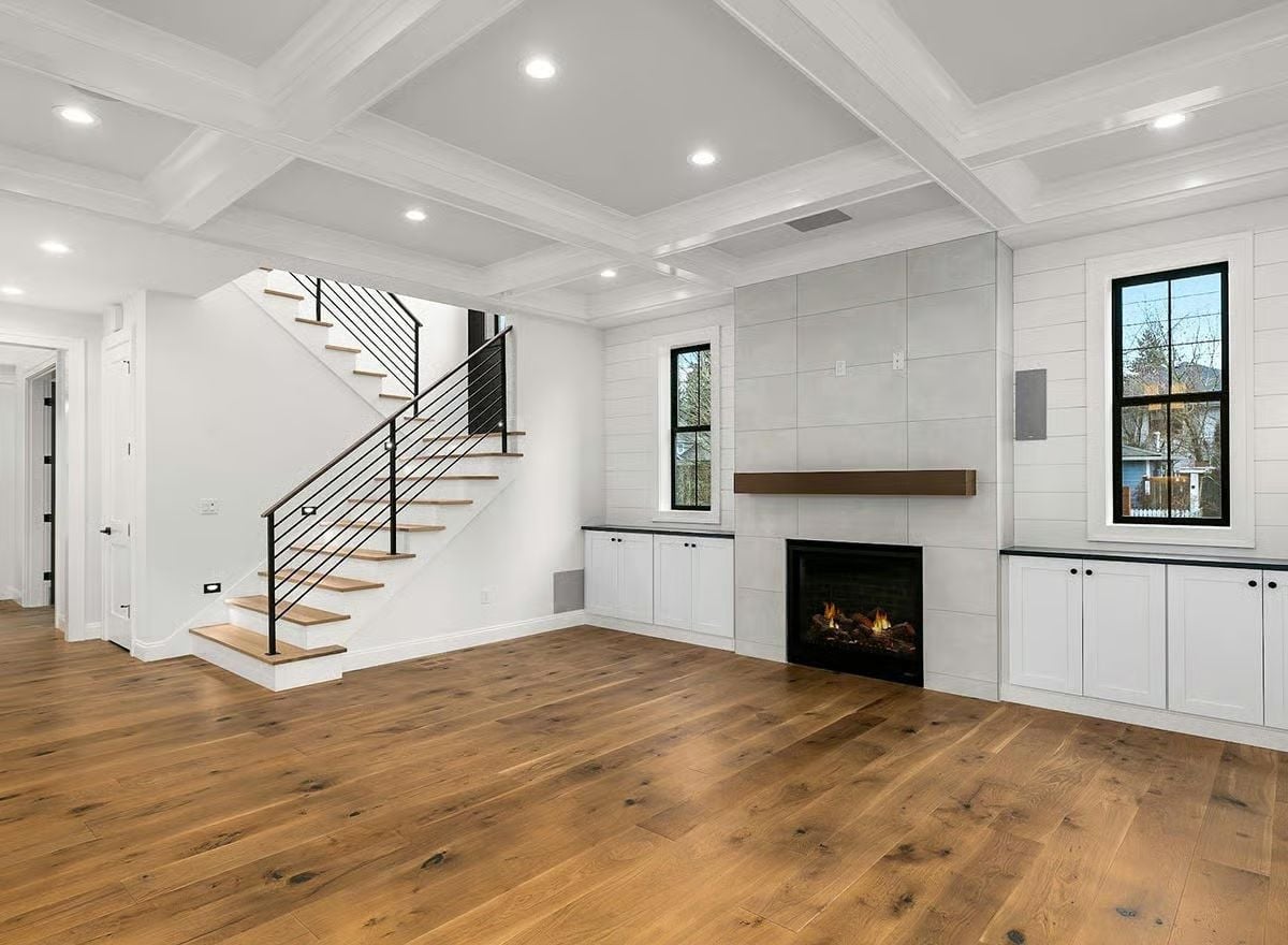 Coffered Ceiling and Shiplap Wall Meet Around a Fireplace Built to Last
