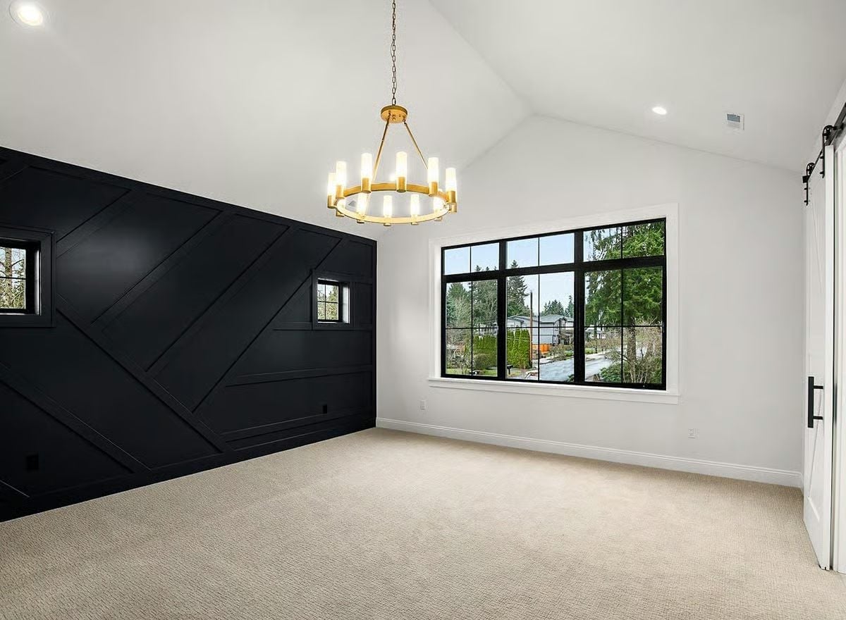 Geometric Black Wall Paneling Makes Every Other Finish Work Harder