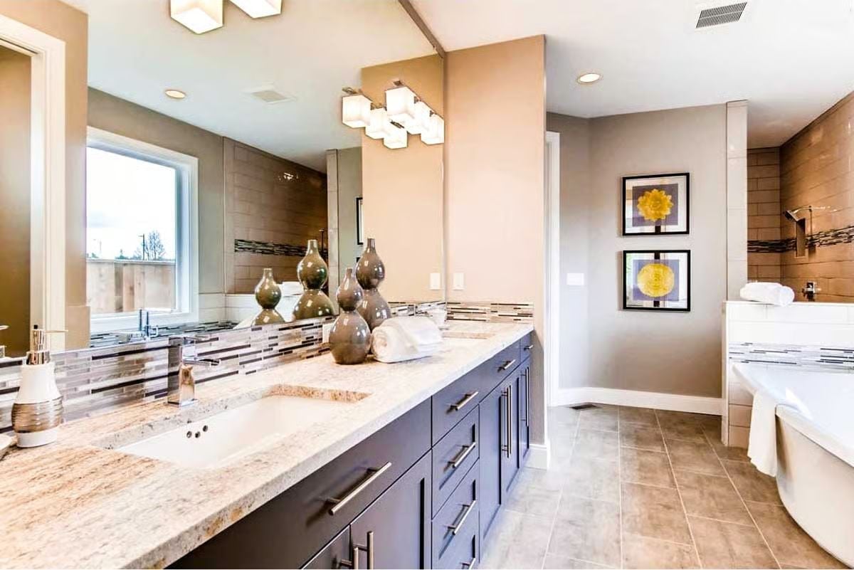 Granite Counters, Dark Cabinetry, and Vases That Earn Their Keep