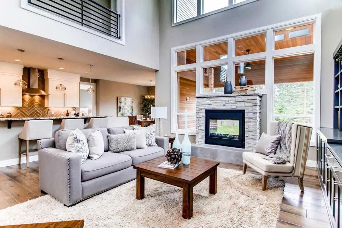 Stone Fireplace, Double-Height Ceilings, and a Layout Built for Two