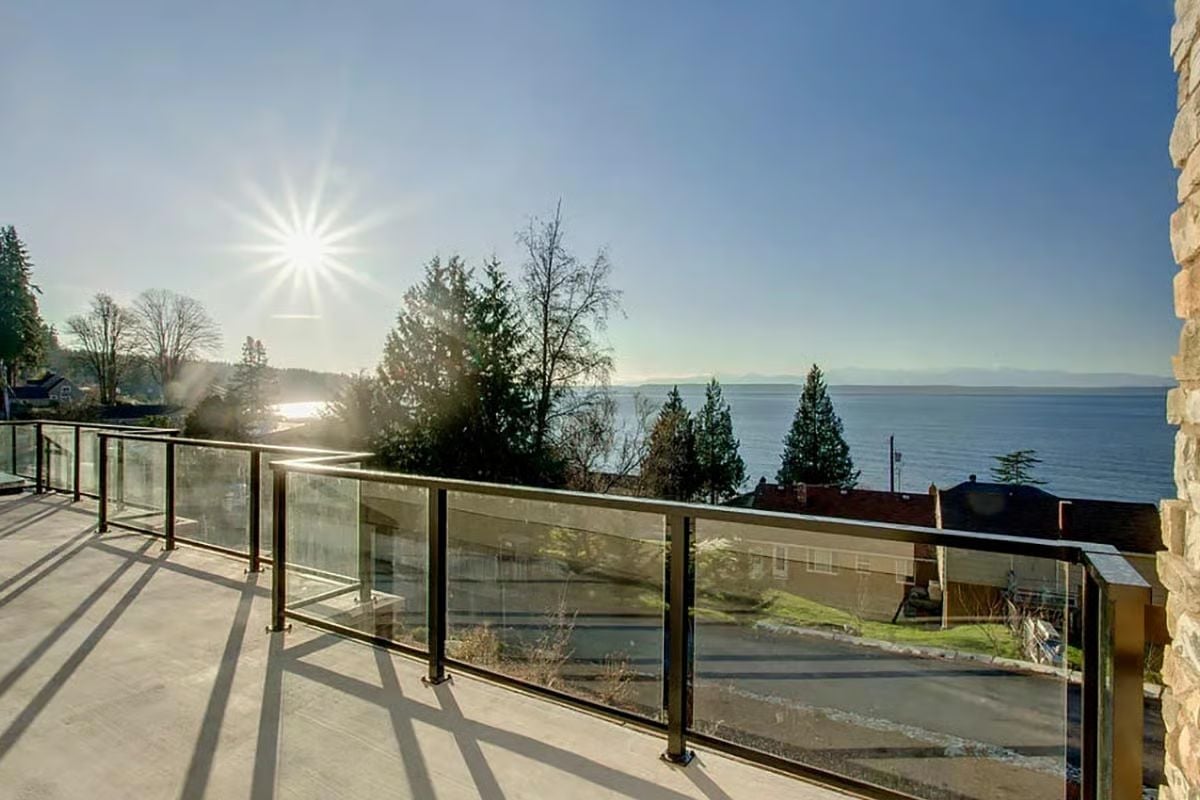 Glass Railings, Open Sky, and a Water View That Earns Every Dollar of the Price Tag