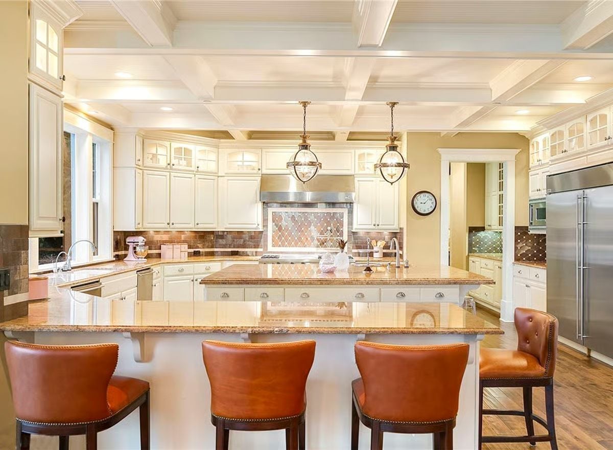 Leather Barstools and Granite That Actually Earns the Square Footage