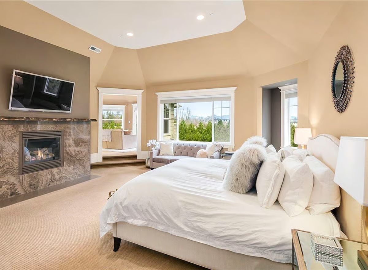 Marble Fireplace Surround, Fur Pillows, and a Sitting Room You'll Actually Use