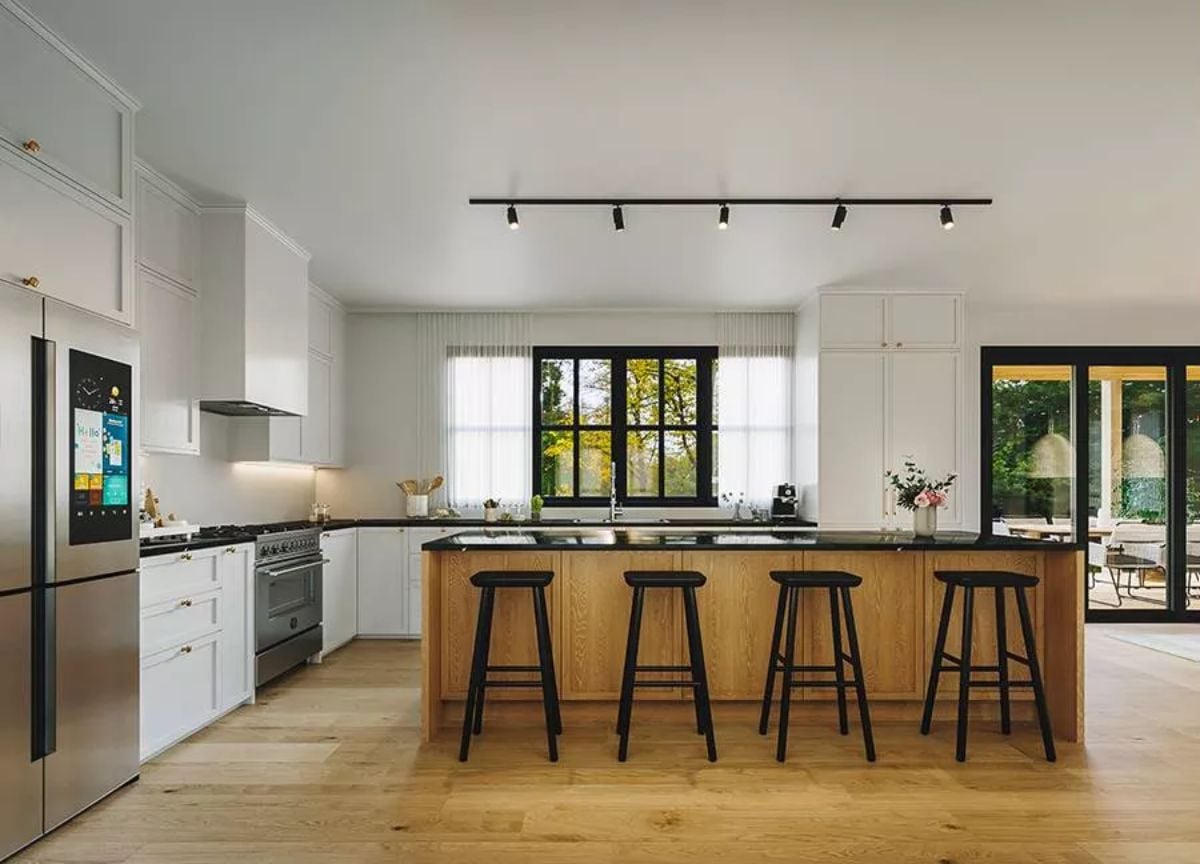 Black Barstools, Warm Oak, and a Kitchen Island That Actually Has Room to Work