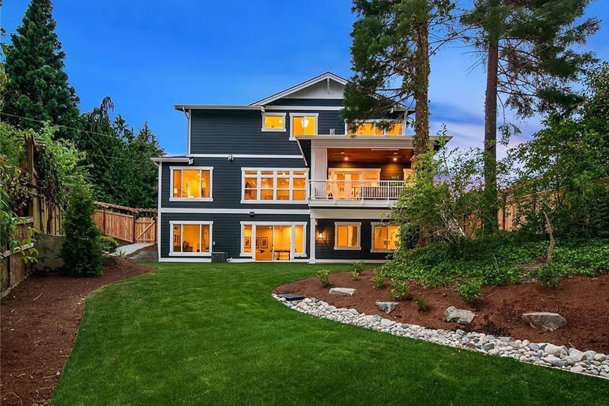 Dark Siding, Three Stories, and a Backyard That Actually Has Room to Breathe