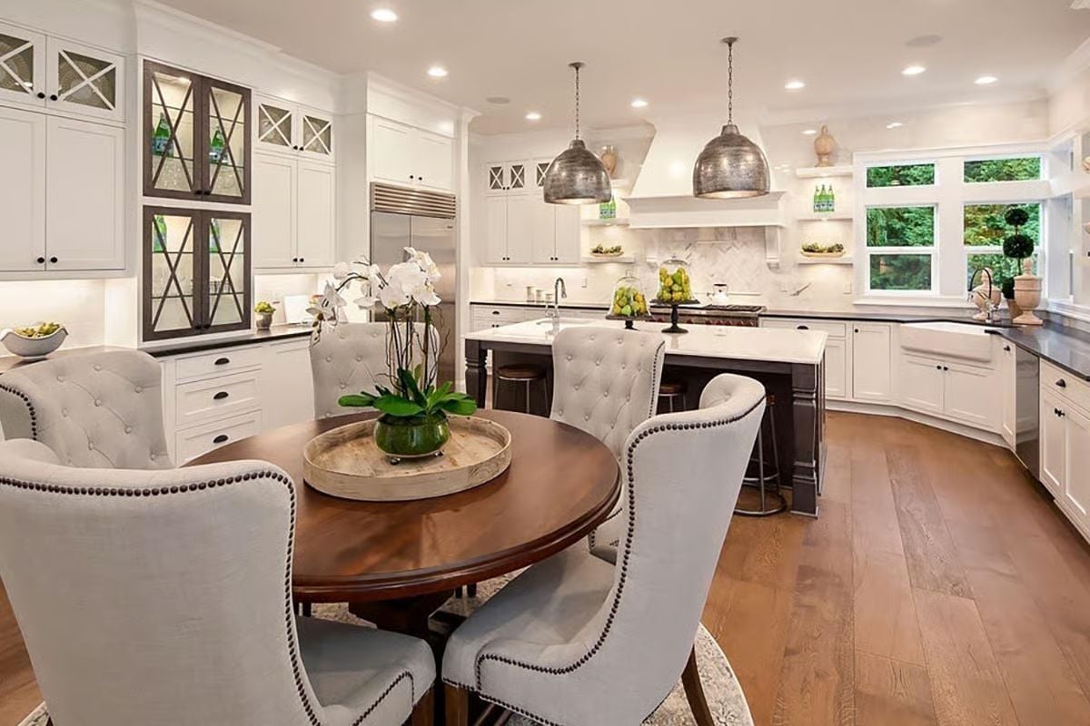 Orchids, Tufted Chairs, and Pendant Lights That Earn Their Keep