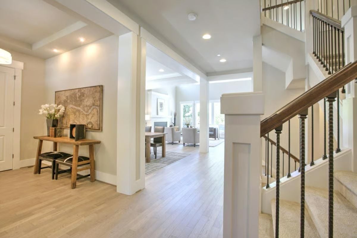 Rope-Turned Balusters and Whitewashed Oak Set the Entry's Whole Tone