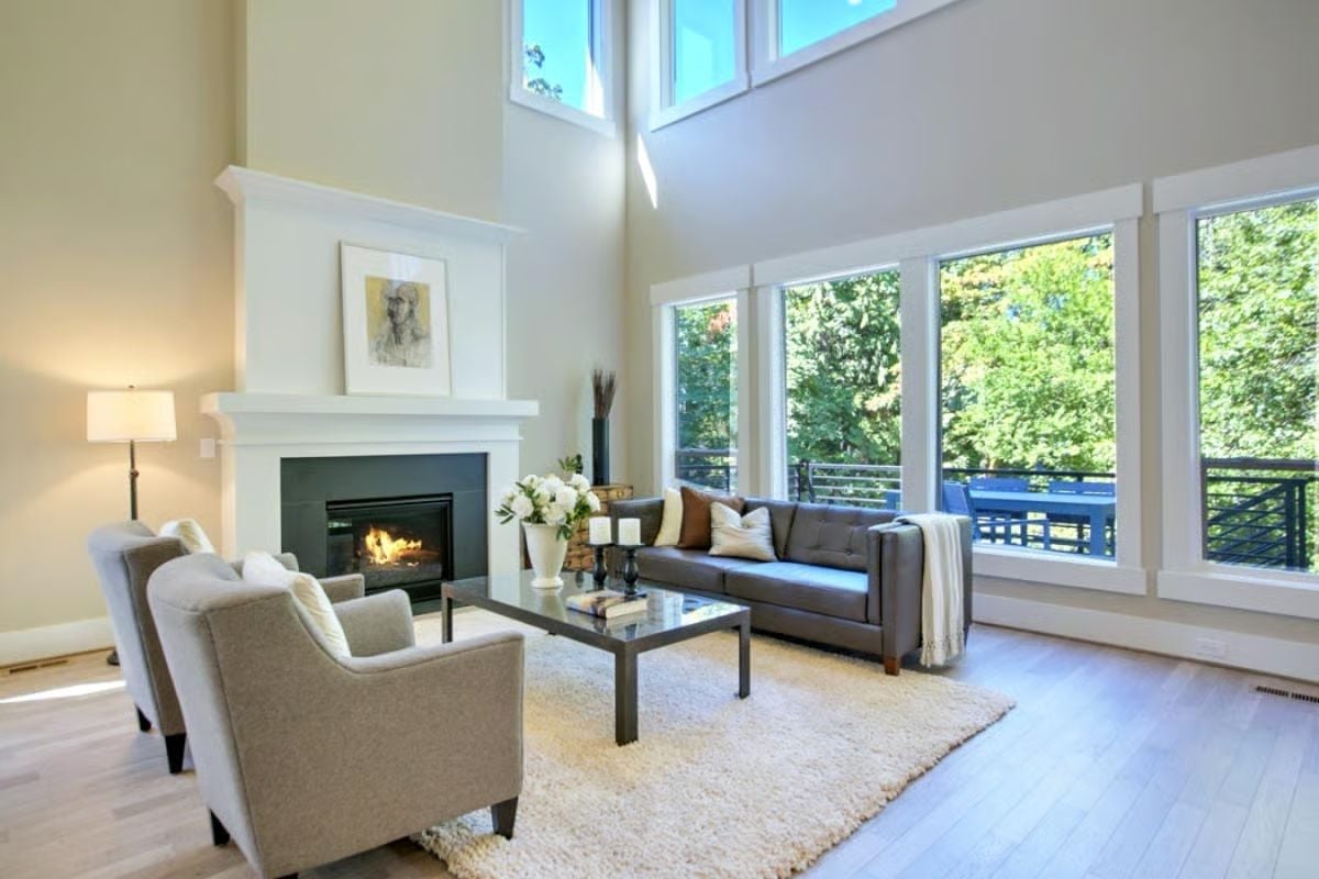 Soaring Ceilings and a Live Fire Make This Living Room Hard to Leave