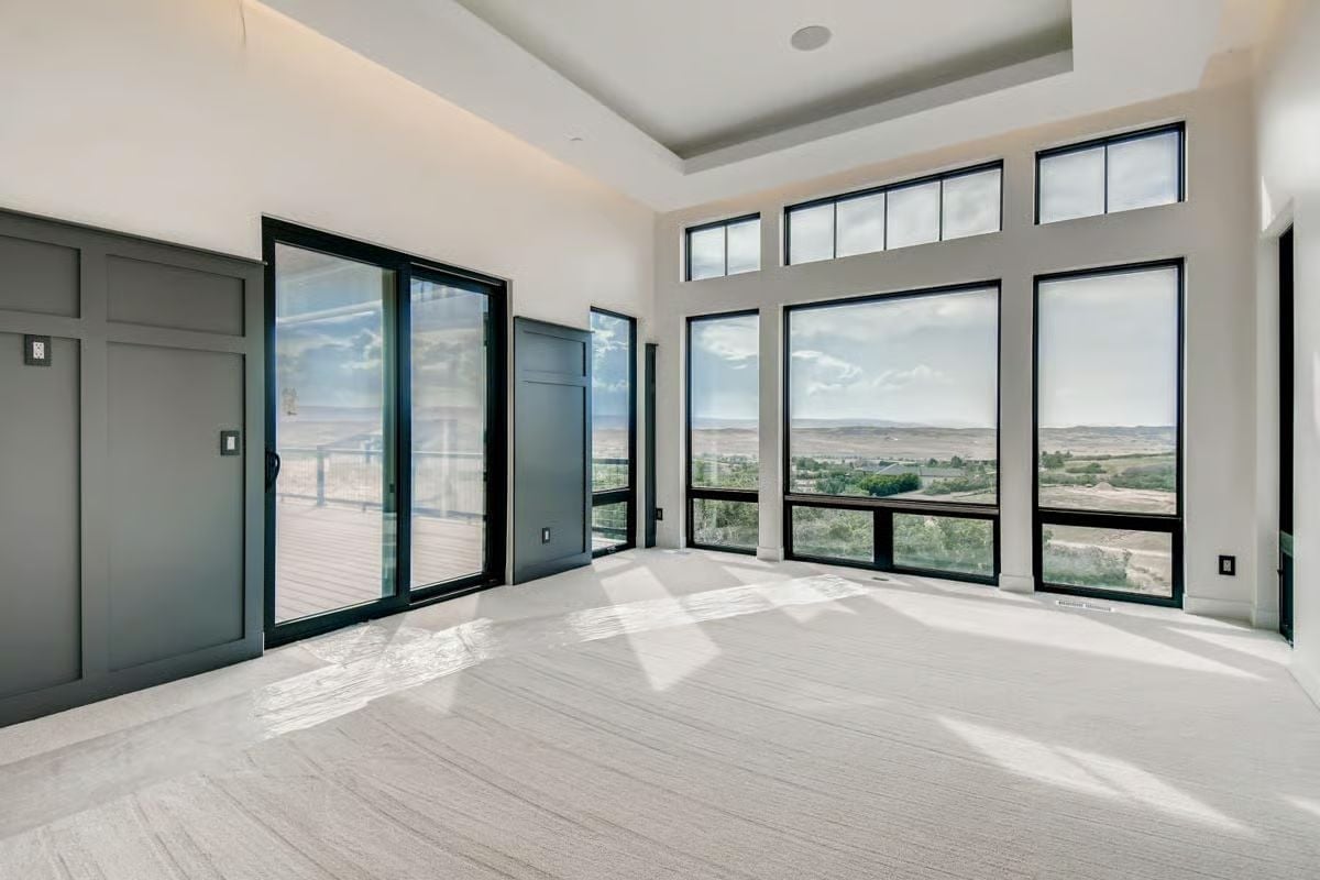 Clerestory Windows, a Deck Door, and Prairie Views Doing the Heavy Lifting