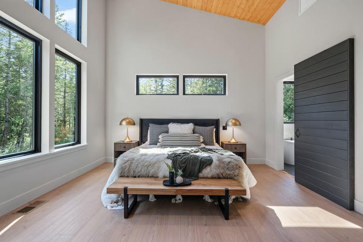 Gold Lamps, Fur Throws, and a Ceiling That Gives the Room Room to Breathe