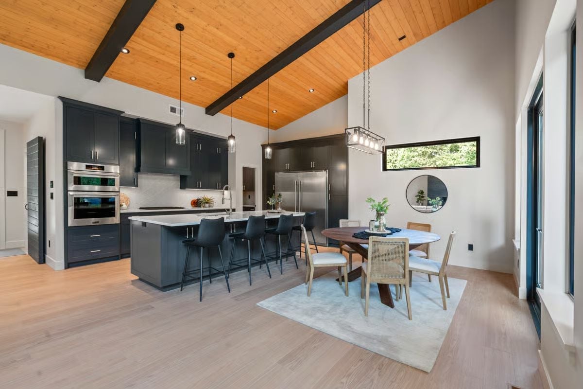 Vaulted Cedar, Navy Cabinetry, and an Island Built for Staying a While