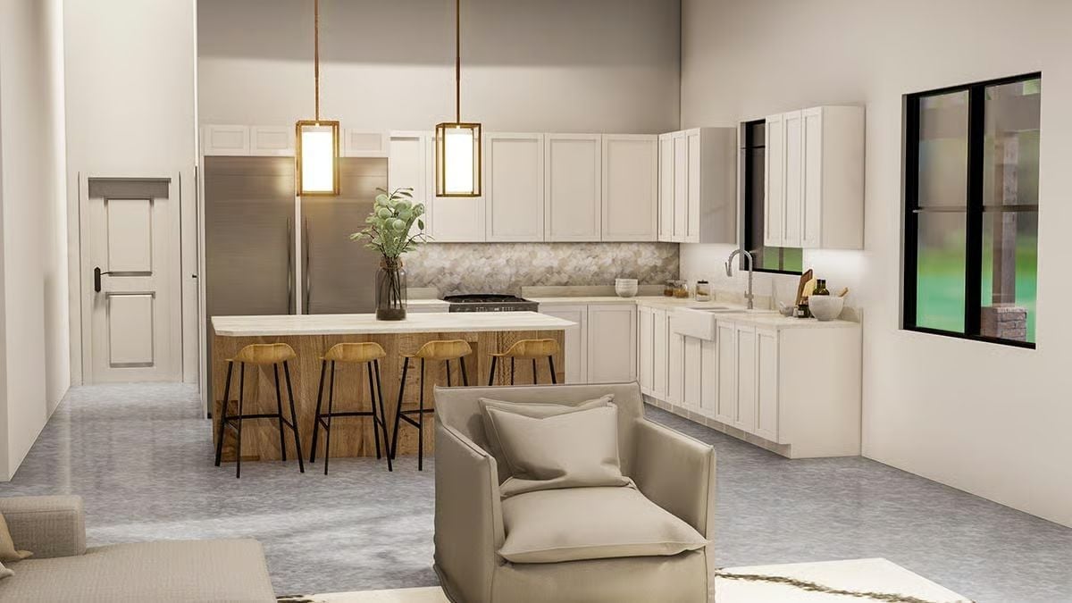Gold Pendants, Wood Barstools, and a Kitchen Island That Does the Heavy Lifting