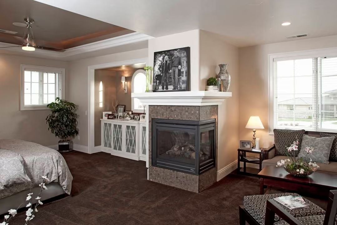 Bedroom-Side Fireplace With Three-Way Glass Earns Its Keep on Both Sides of the Wall