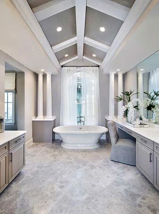 Columns, a Soaking Tub, and a Vaulted Ceiling Walk Into a Master Bath