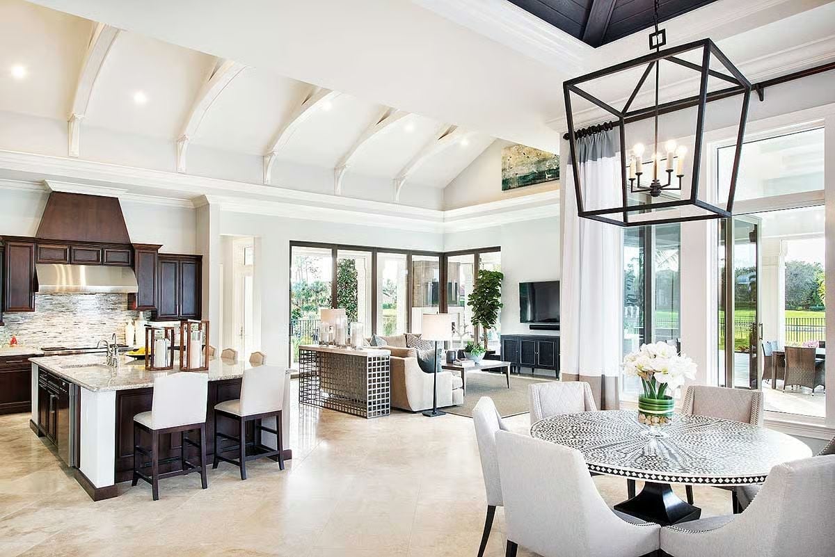 Dark Cabinetry and a Stone Hood Anchor a Kitchen Built for Real Cooking