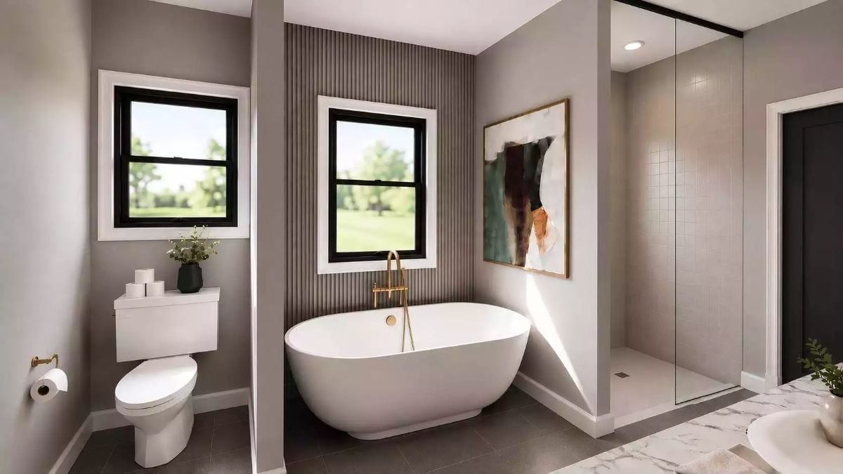 Freestanding Tub With Brass Filler in a Layout That Actually Gives It Room to Breathe
