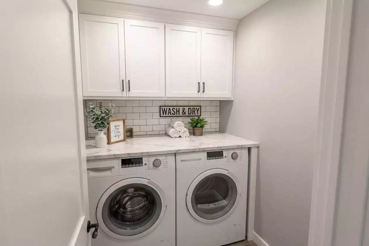 Marble Countertop, Subway Tile, and a "Wash & Dry" Sign That Earns Its Place