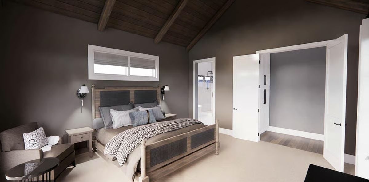 Exposed Beams, Charcoal Walls, and a Bed Frame That Commands the Room