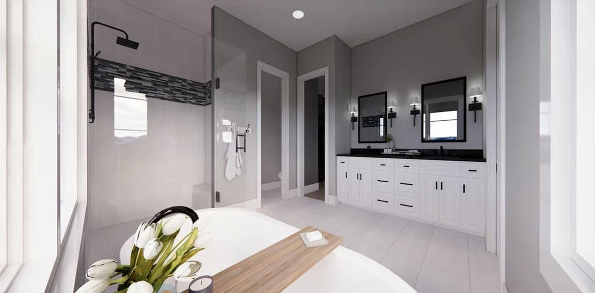 Matte Black, White Tulips, and a Soaking Tub That Makes the Whole Room Make Sense