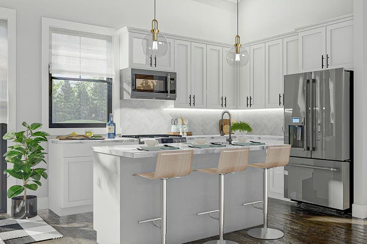 Globe Pendants and Marble Counters in a Kitchen That Earns Its Keep