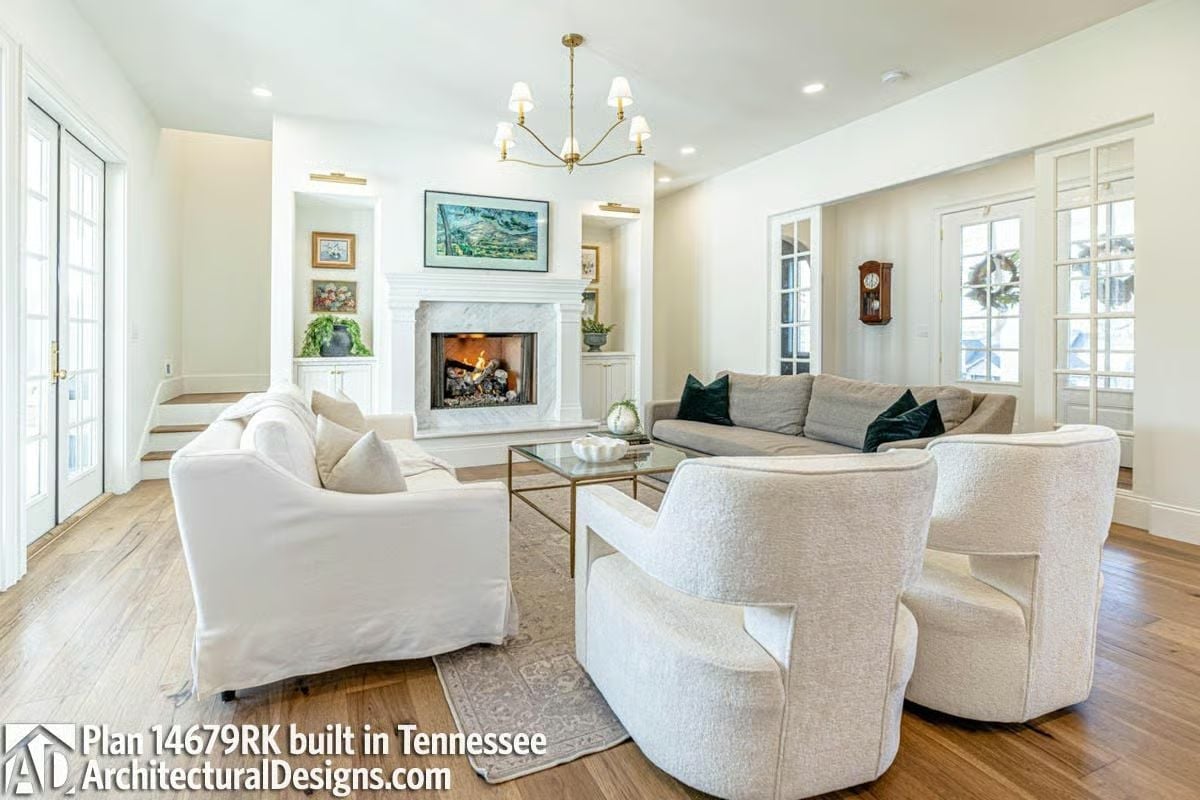 Marble Fireplace, Gold Chandelier, and Furniture That Actually Invites You to Sit