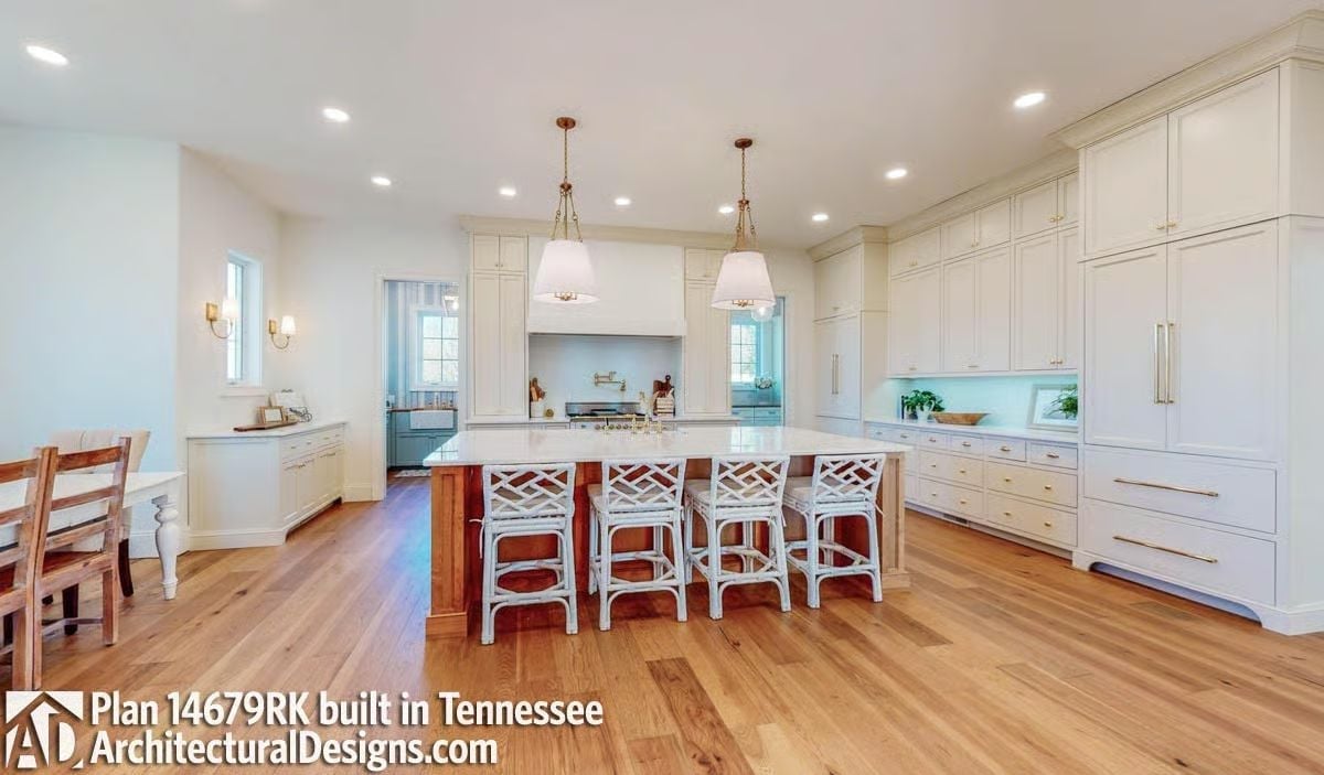 Warm Wood Base, White Quartz Top, and Four Rattan Barstools That Mean Business