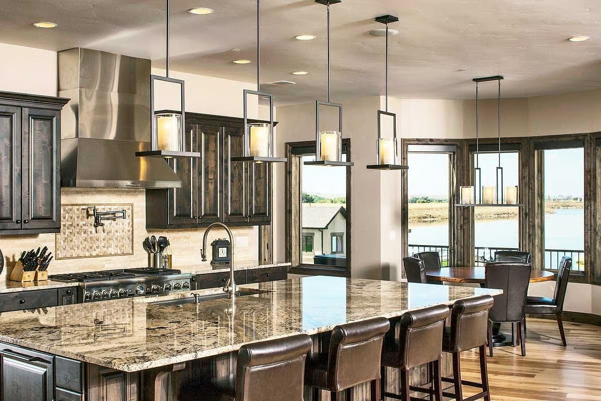 Granite That Wide and Pendants That Low Mean Business in This Kitchen