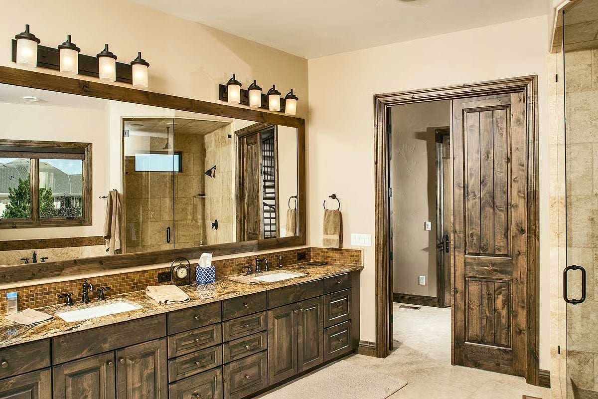 Knotty Alder Cabinets and a Granite Run This Long Redefine What a Master Bath Can Be