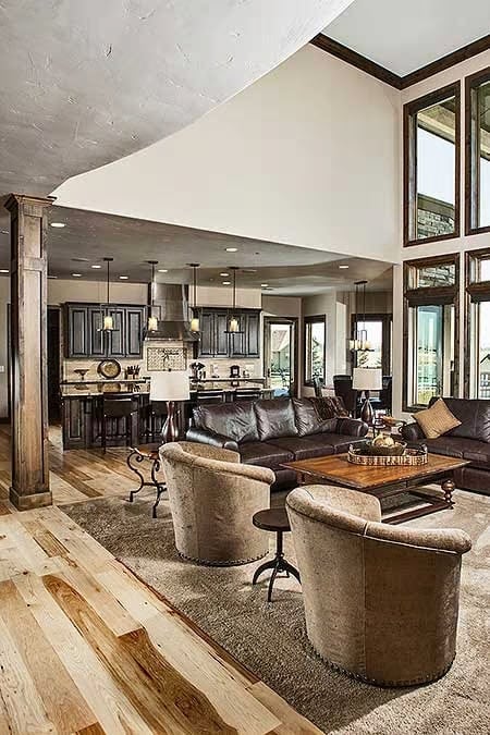 Leather, Wood, and Two-Story Glass Pull the Outdoors Into Every Conversation