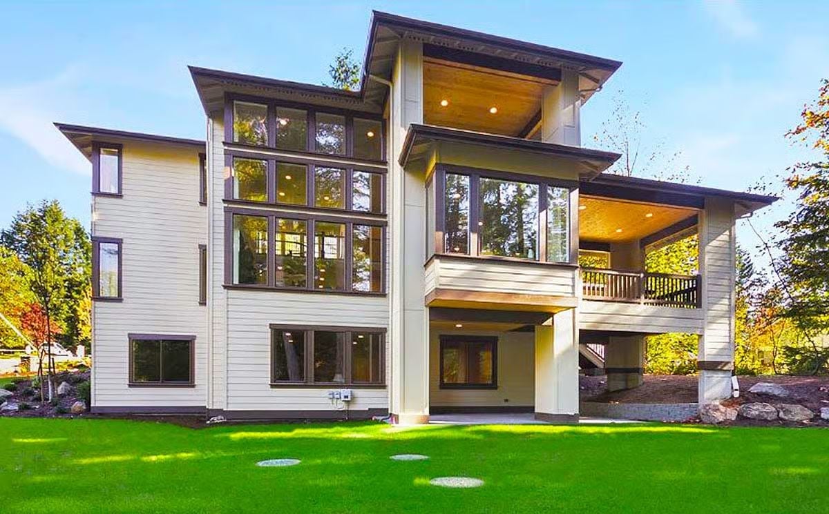 Covered Deck, Wrapped Glass, and Three Floors That Earn Every Square Foot