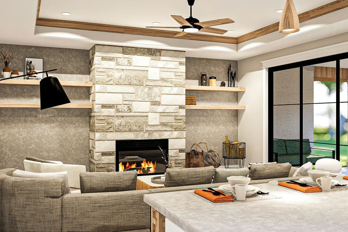 Stone Fireplace, Floating Shelves, and a Sofa Arrangement That Pulls It All Together