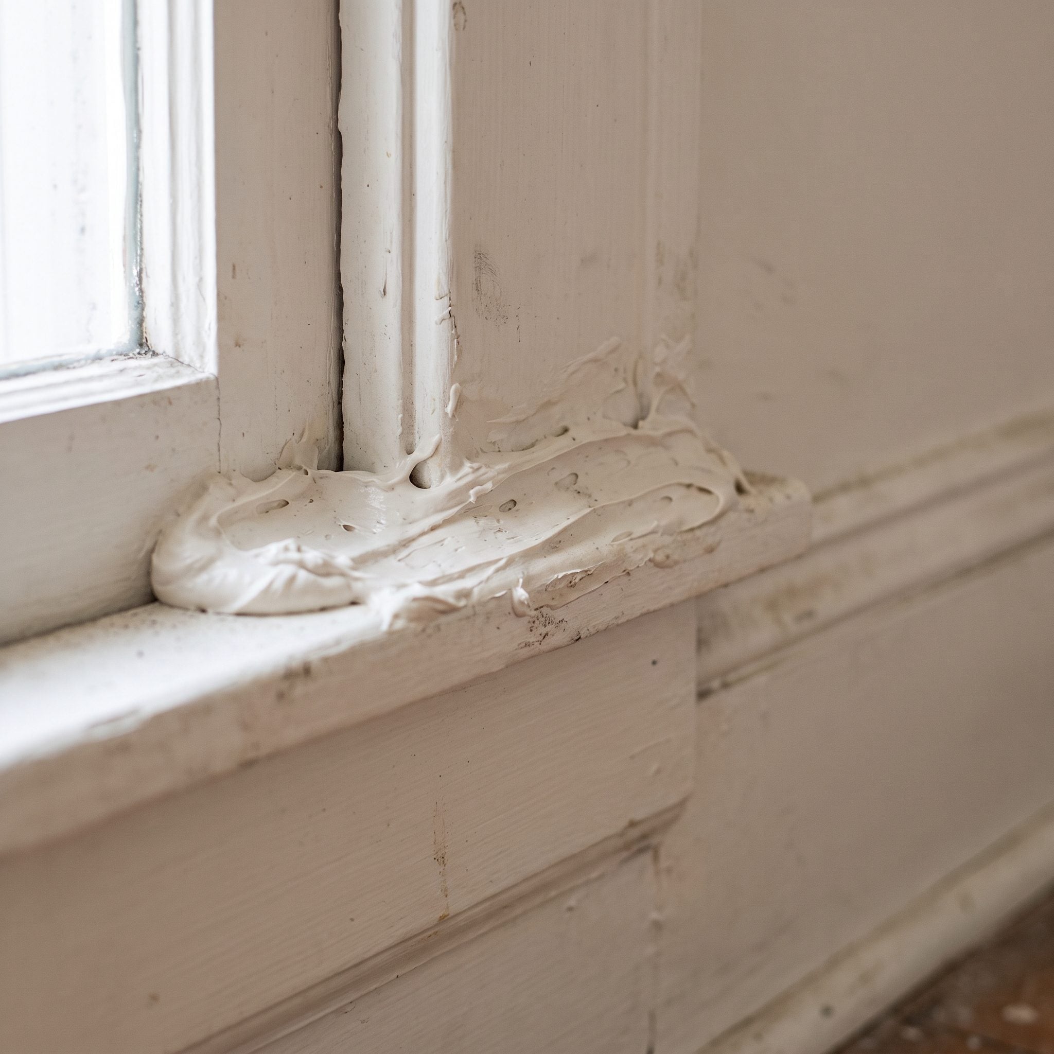 Caulk Smeared Over Gaps That Should Never Have Existed