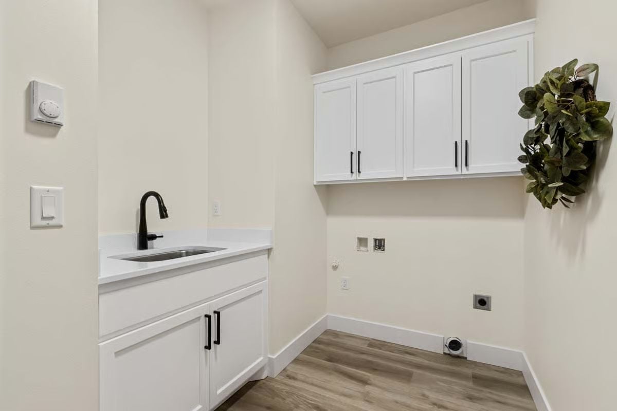 Matte Black Faucet, Upper Cabinets, and a Laundry Room That Actually Has Counter Space