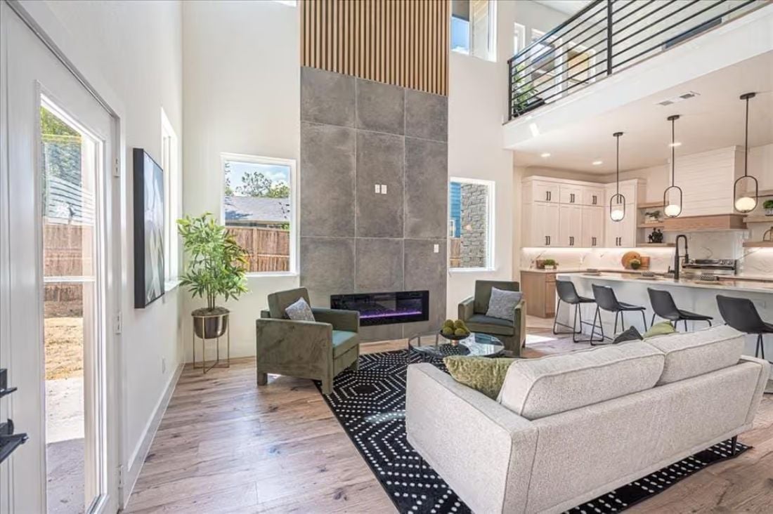 Floor-to-Ceiling Tile Around the Fireplace Earns Every Inch of That Wall
