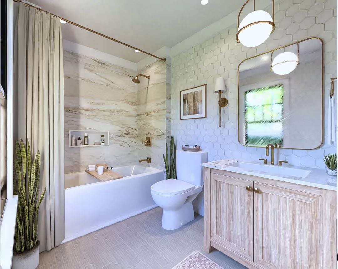 Brass Fixtures and Hexagonal Tile Make This Bathroom Worth Getting Up For