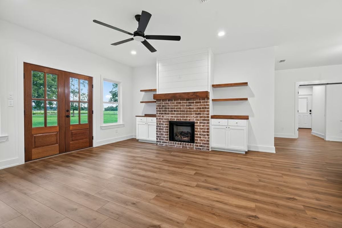 Brick Fireplace with a Raw Wood Mantel That Earns Its Place in the Room