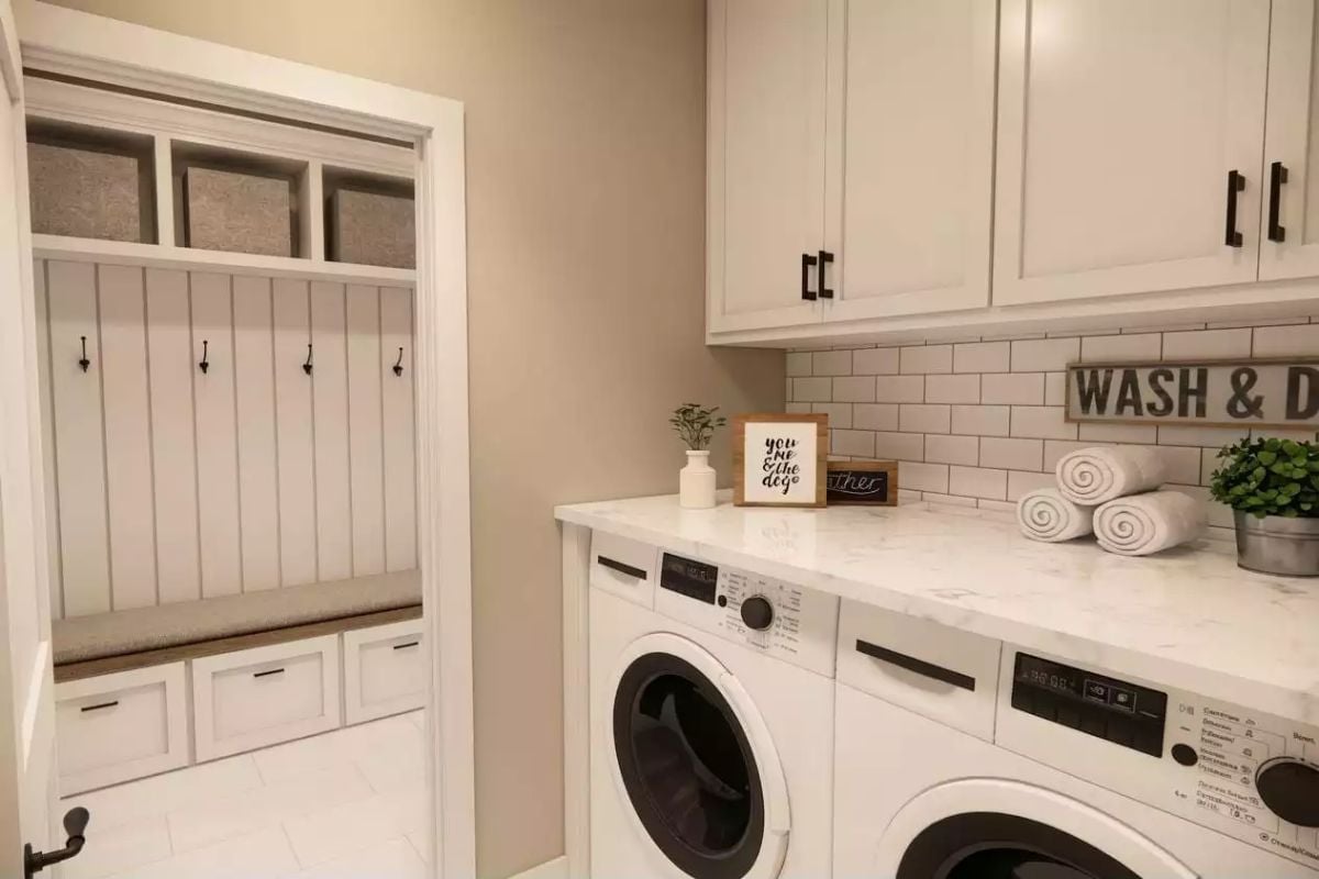 Mudroom Hooks and Marble Counters Sharing a Wall Without Competing
