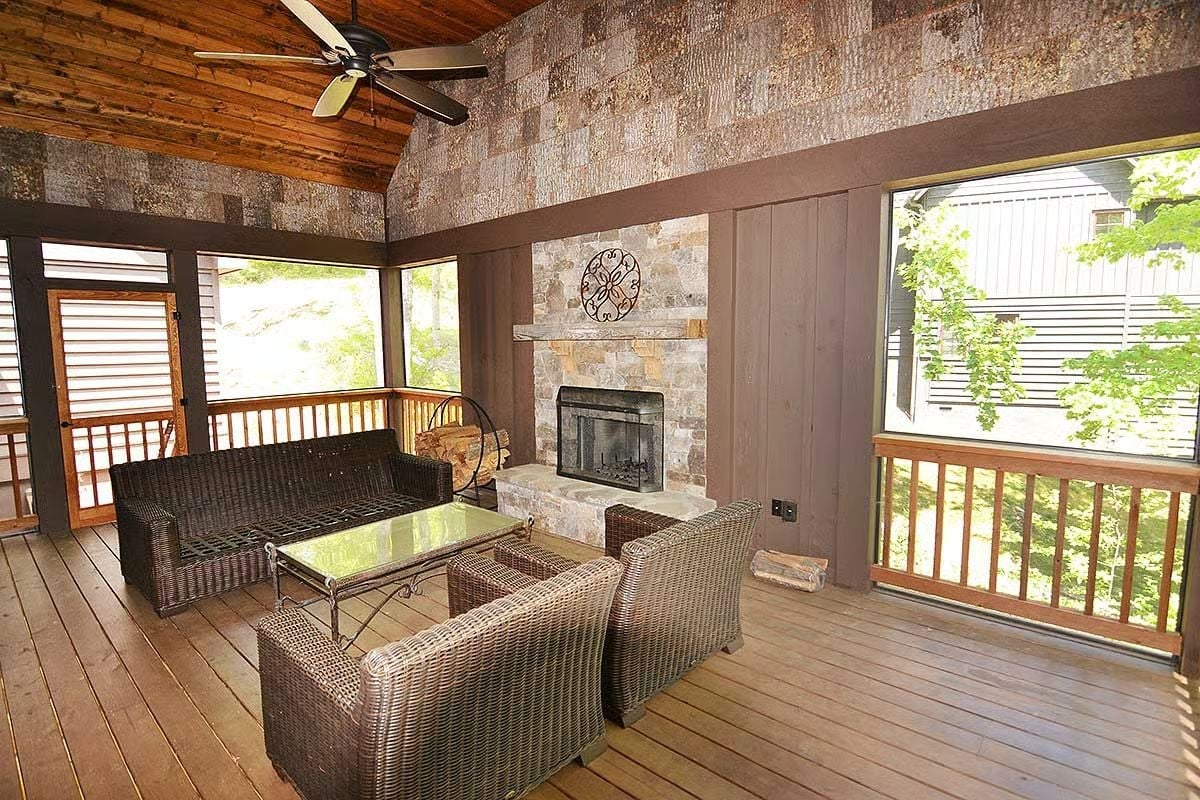 Screened Porch With a Stone Fireplace and Nowhere You'd Rather Be