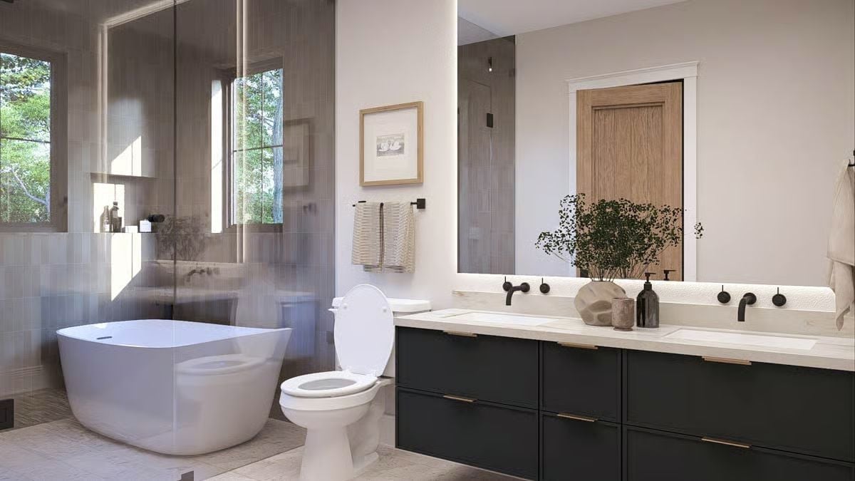 Freestanding Tub Inside a Glass Enclosure Changes the Whole Geometry of the Room