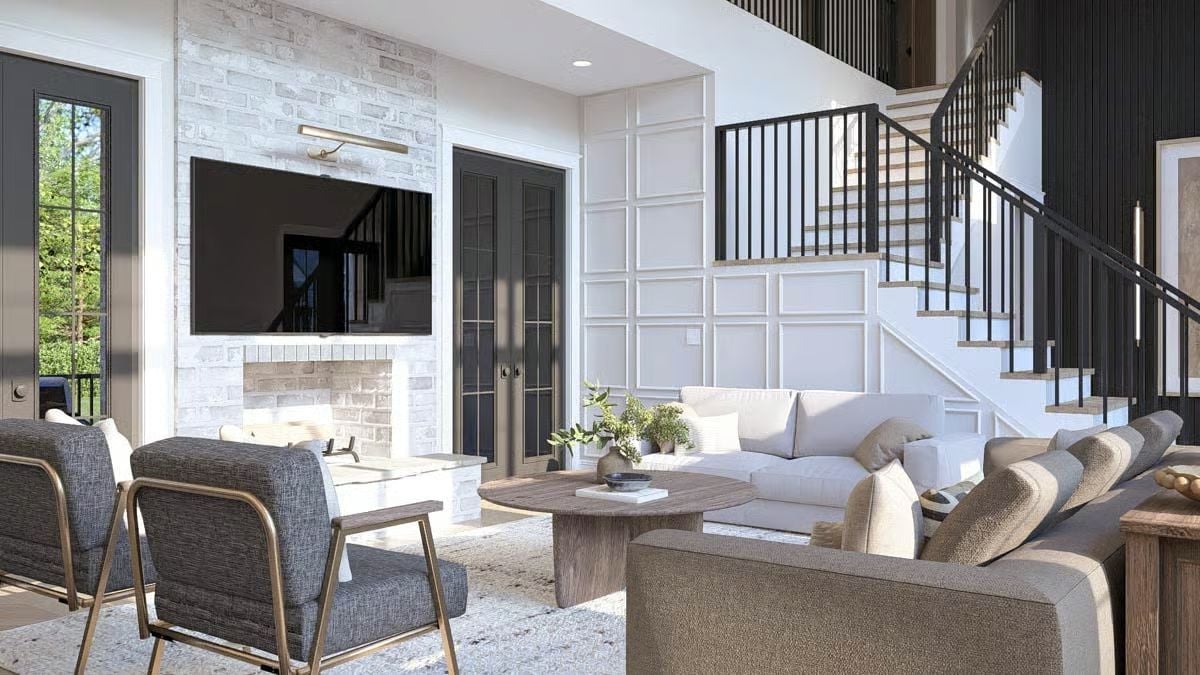 Whitewashed Brick, Black Steel, and a Fireplace That Earns Its Wall