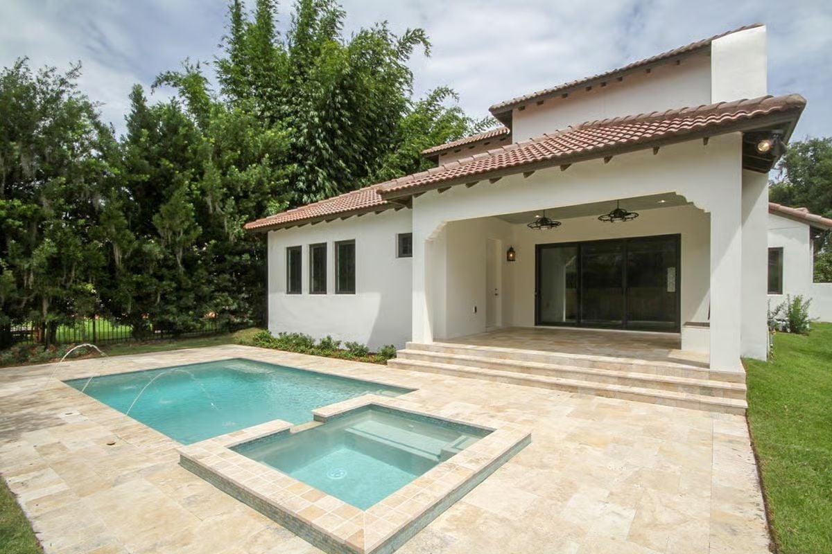 Travertine Deck and Covered Lanai Built for Year-Round Living