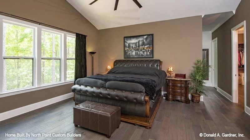 Dark Leather, Vaulted Ceiling, and a Footboard Worth the Splurge