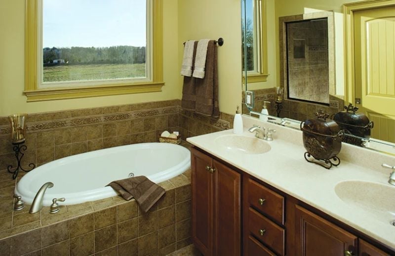 Oval Soaking Tub and Double Vanity Built for Two People Who Actually Share Well